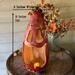 A handmade spooky pumpkin gourd to with an extra large mouth. This ghostly pumpkin is 16 inches tall and 6 inches wide